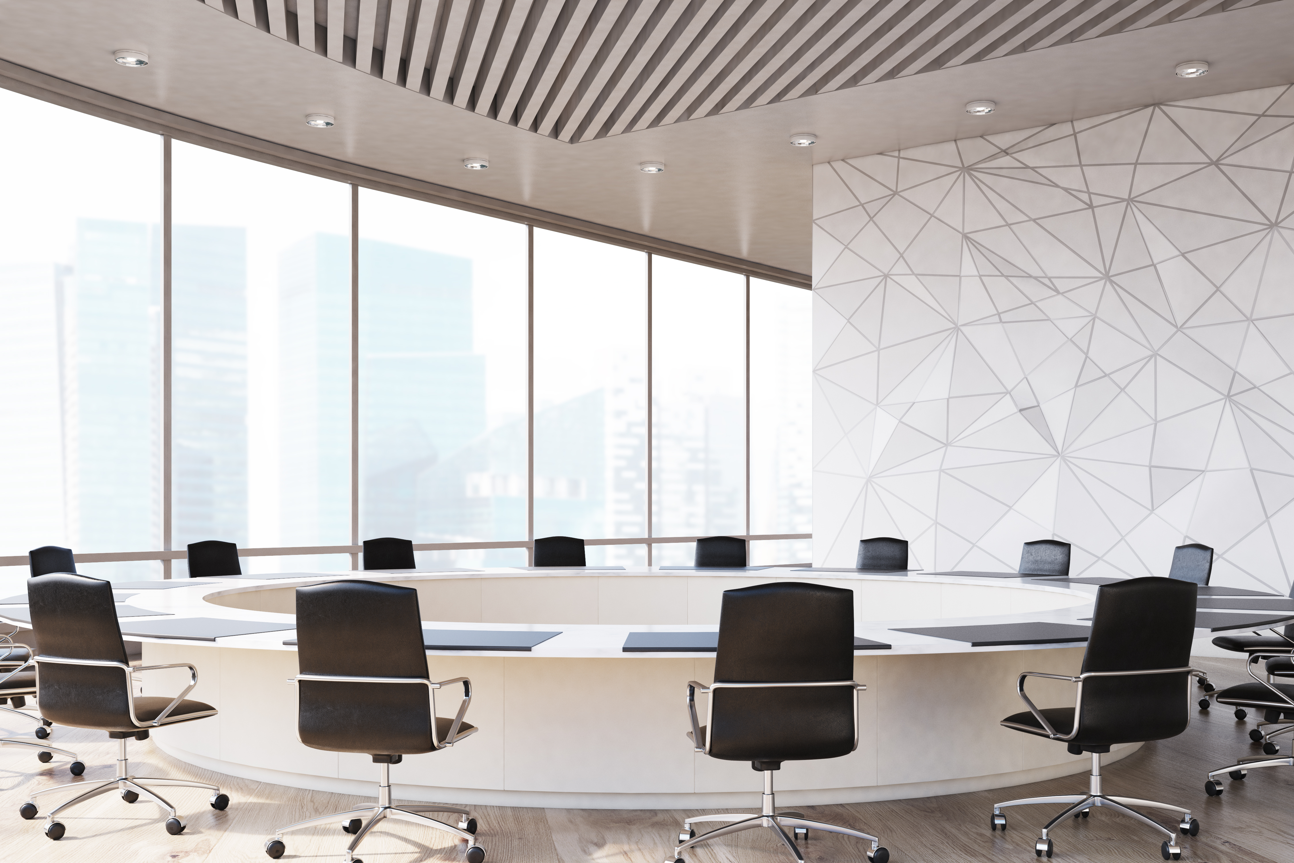 Conference Room Interior With A Round Table Black Office Chairs